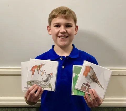 Jack holding christmas cards